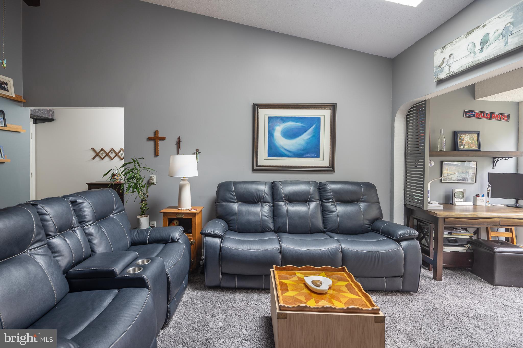 9210 Caspian Way, Unit 302 Manassas, VA 20110 - Photo 9 of 40 a living room with furniture
