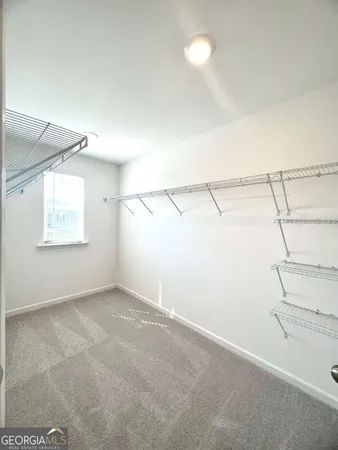 a view of a room with racks on the wall