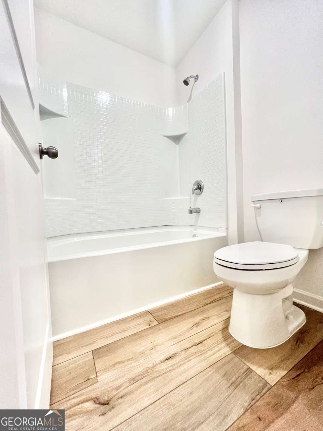 1529 Haypatch Lane Loganville, GA 30052 - Photo 20 of 24 a bathroom with a sink and a toilet