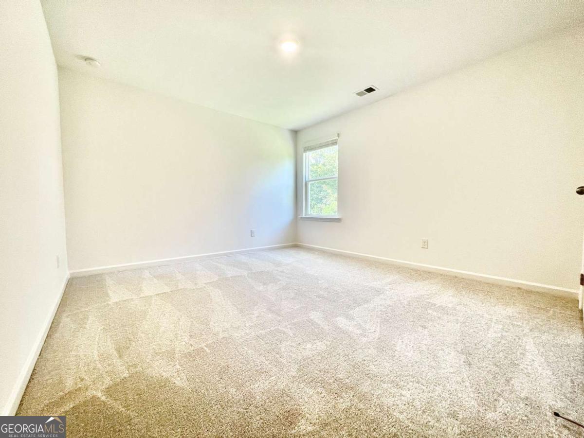 1529 Haypatch Lane Loganville, GA 30052 - Photo 21 of 24 a view of an empty room