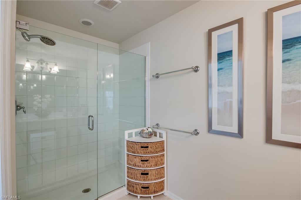 16211 Ravina Way, Unit 18 Naples, FL 34110 - Photo 16 of 25 a bathroom with a shower