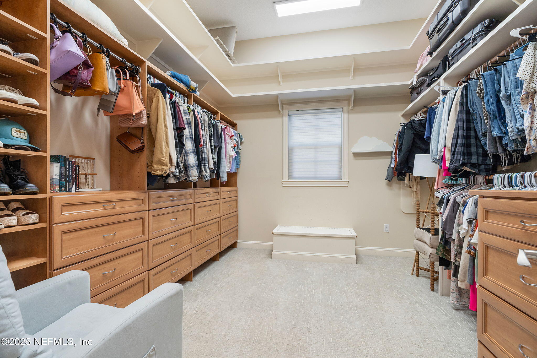 1141 Popolee Road St. Johns, FL 32259 - Photo 33 of 79 a view of walk in closet with clothes and shoes