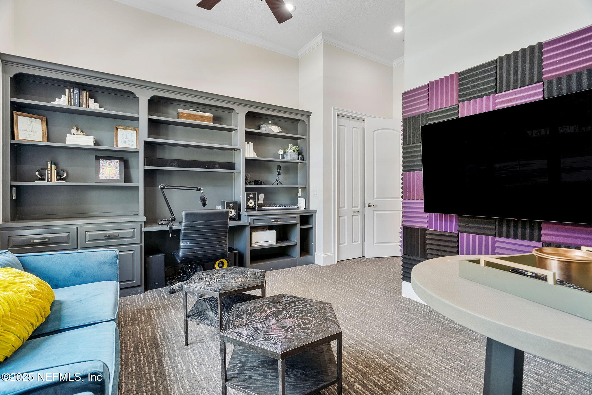 1141 Popolee Road St. Johns, FL 32259 - Photo 41 of 79 a living room with furniture and a flat screen tv