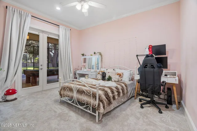 front view of a house with a tree in a yard