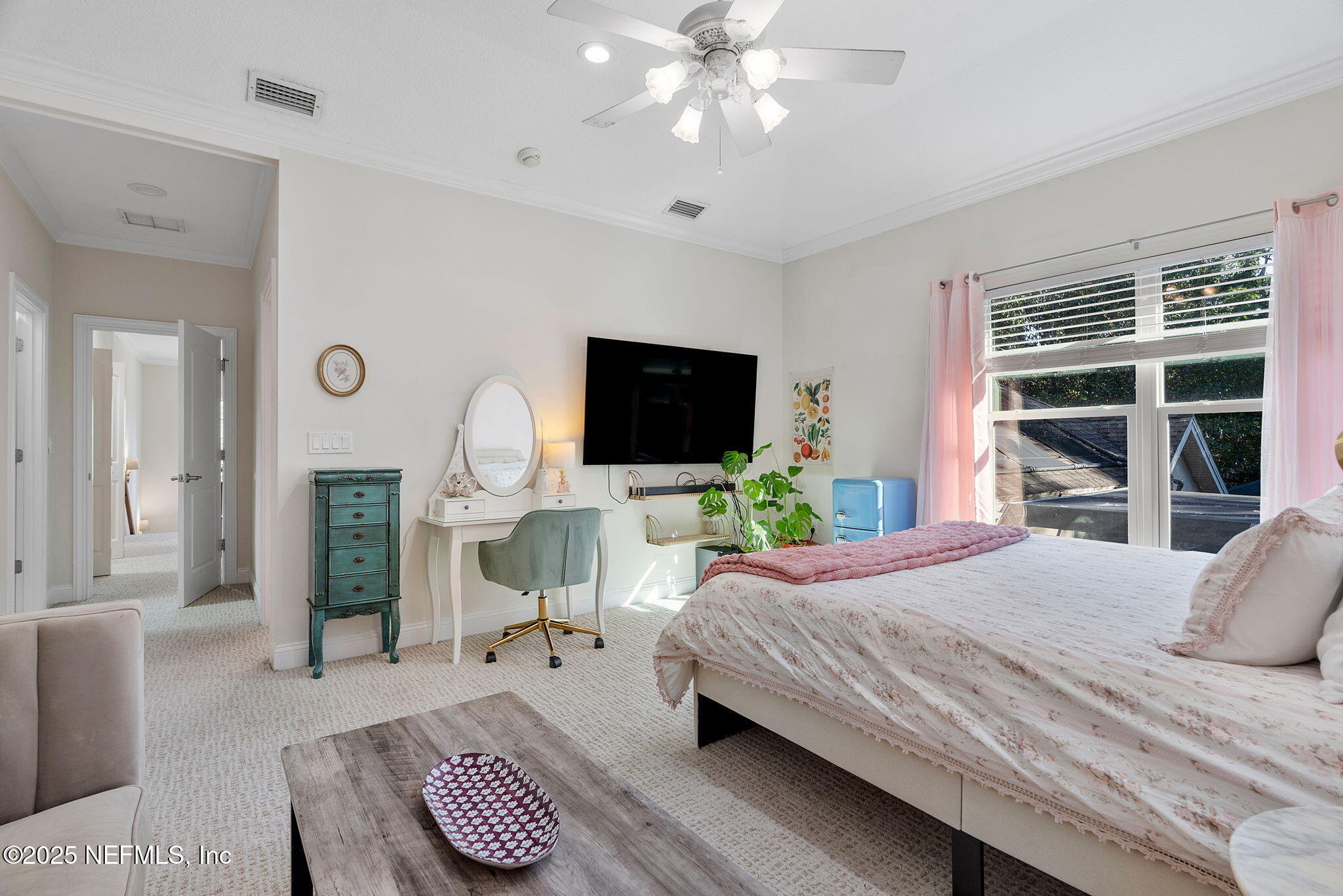 1141 Popolee Road St. Johns, FL 32259 - Photo 50 of 79 a bedroom with a bed couches and a flat tv screen