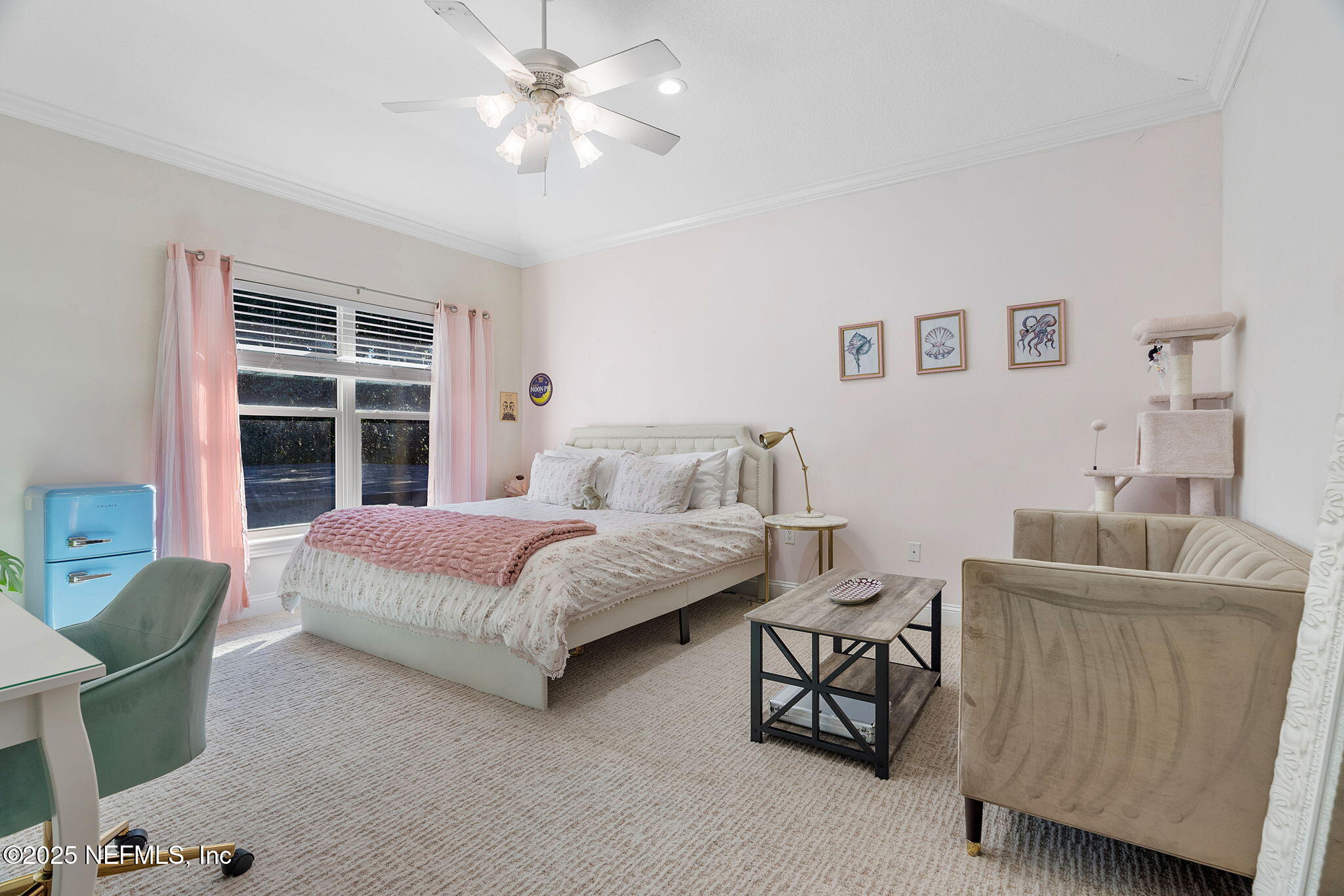 1141 Popolee Road St. Johns, FL 32259 - Photo 51 of 79 a spacious bedroom with a bed and a couch