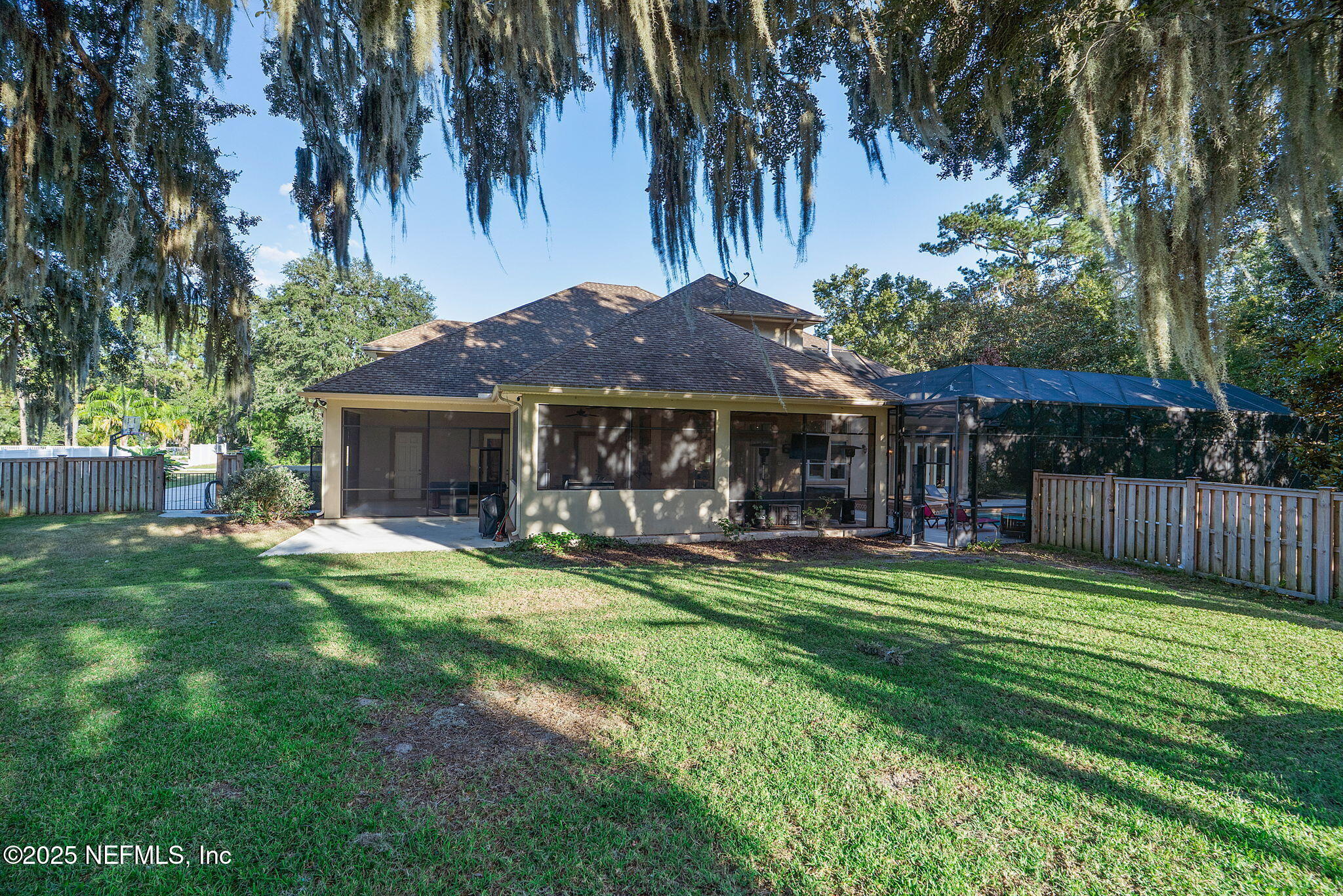 1141 Popolee Road St. Johns, FL 32259 - Photo 64 of 79 a front view of a house with swimming pool having outdoor seating