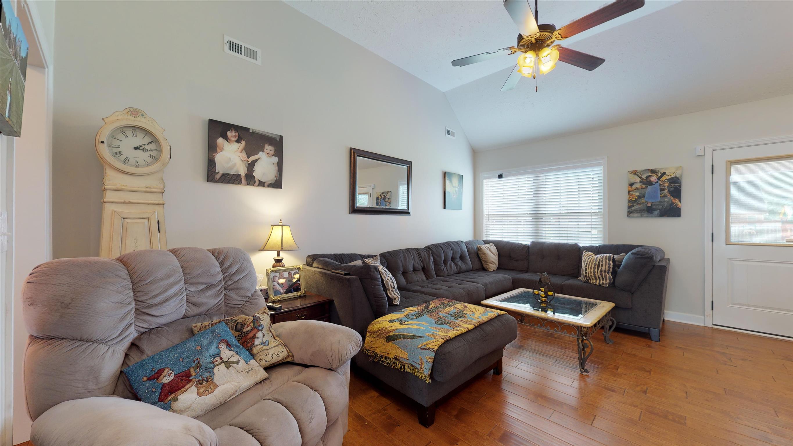 108 Riddick Court Murfreesboro, TN 37127 - Photo 2 of 14 Bright and open living room with wood floors
