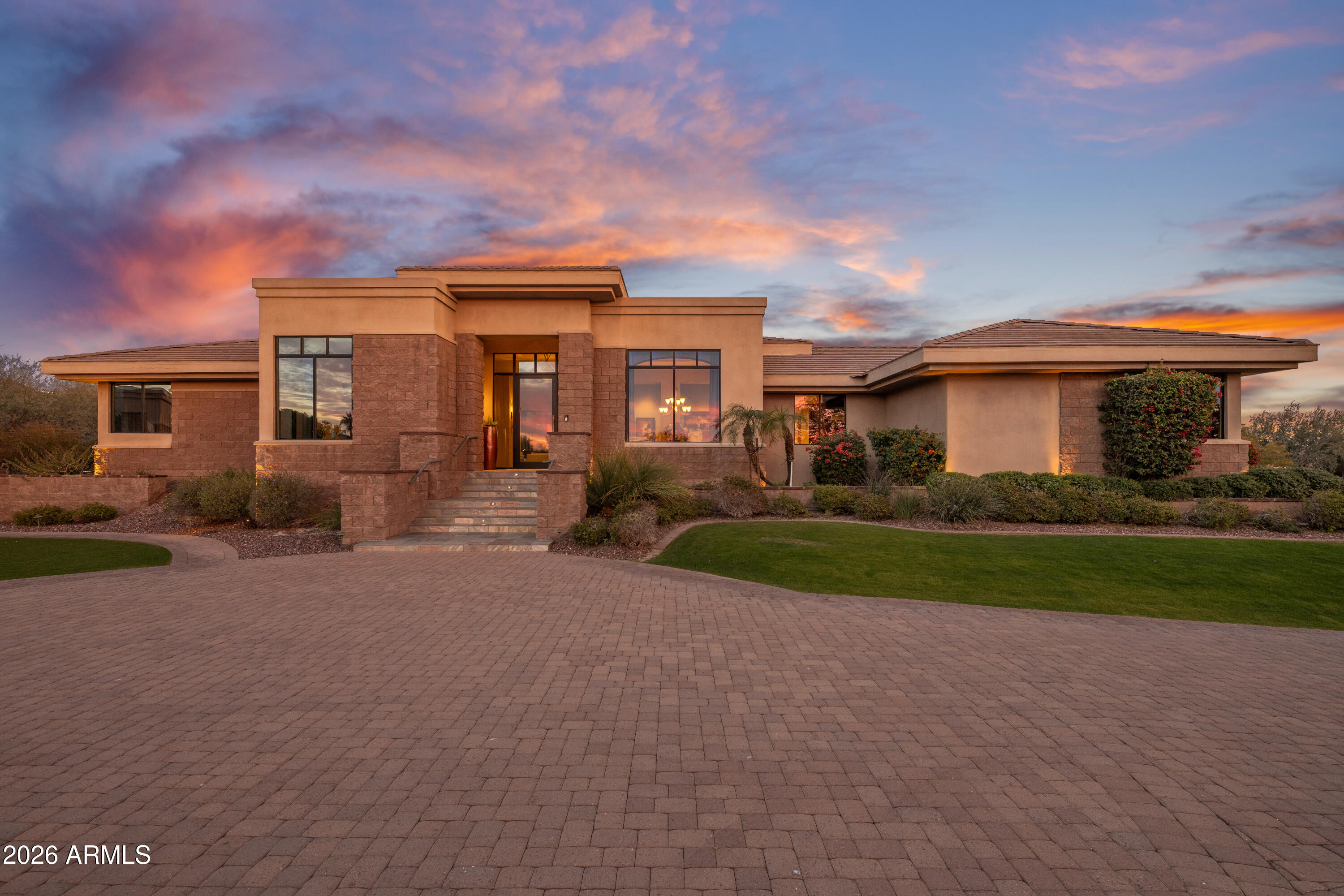6109 North Palo Cristi Road Paradise Valley, AZ 85253 - Photo 2 of 52 Front of residence at dusk