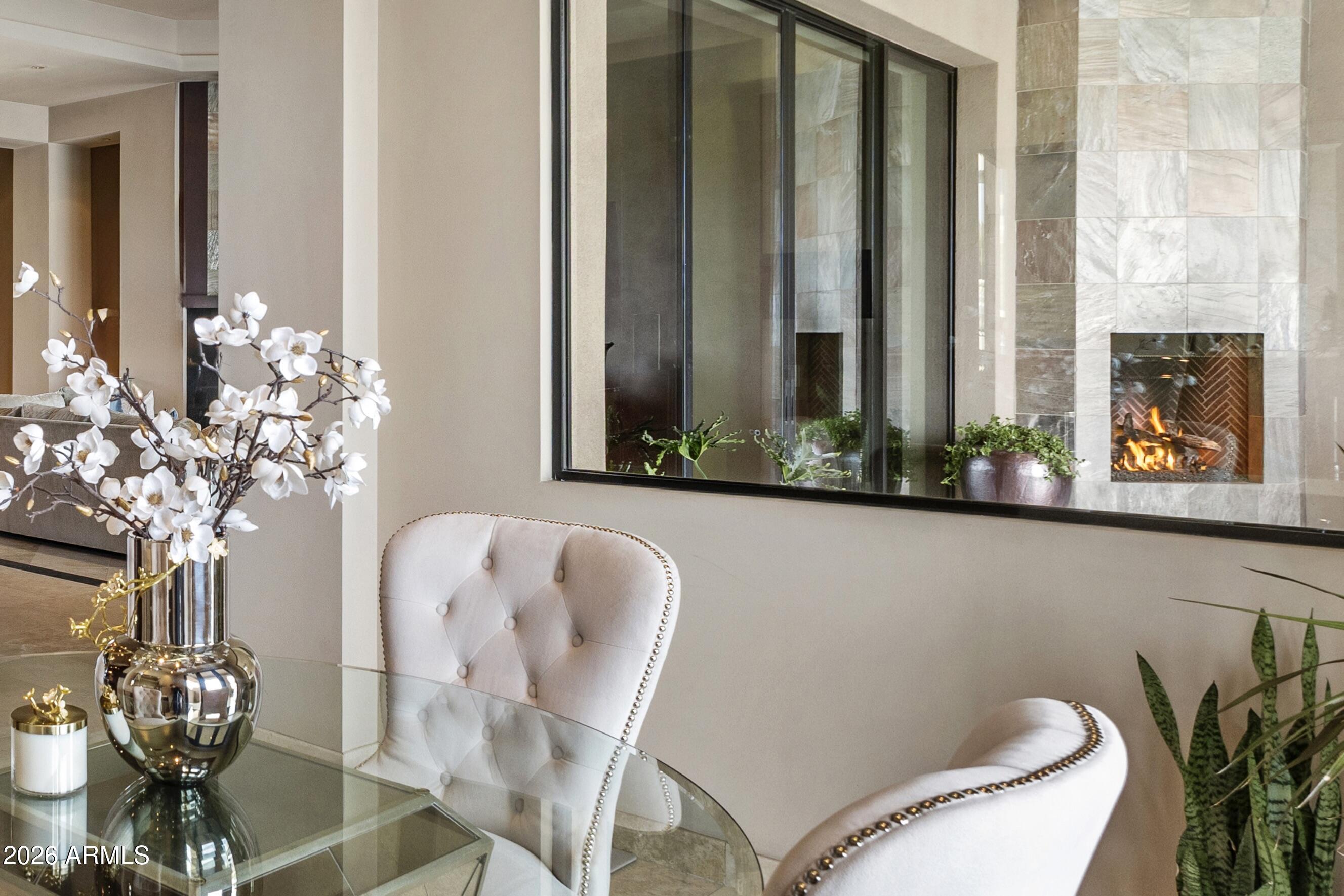 6109 North Palo Cristi Road Paradise Valley, AZ 85253 - Photo 21 of 76 a view of a dining room with furniture and chandelier