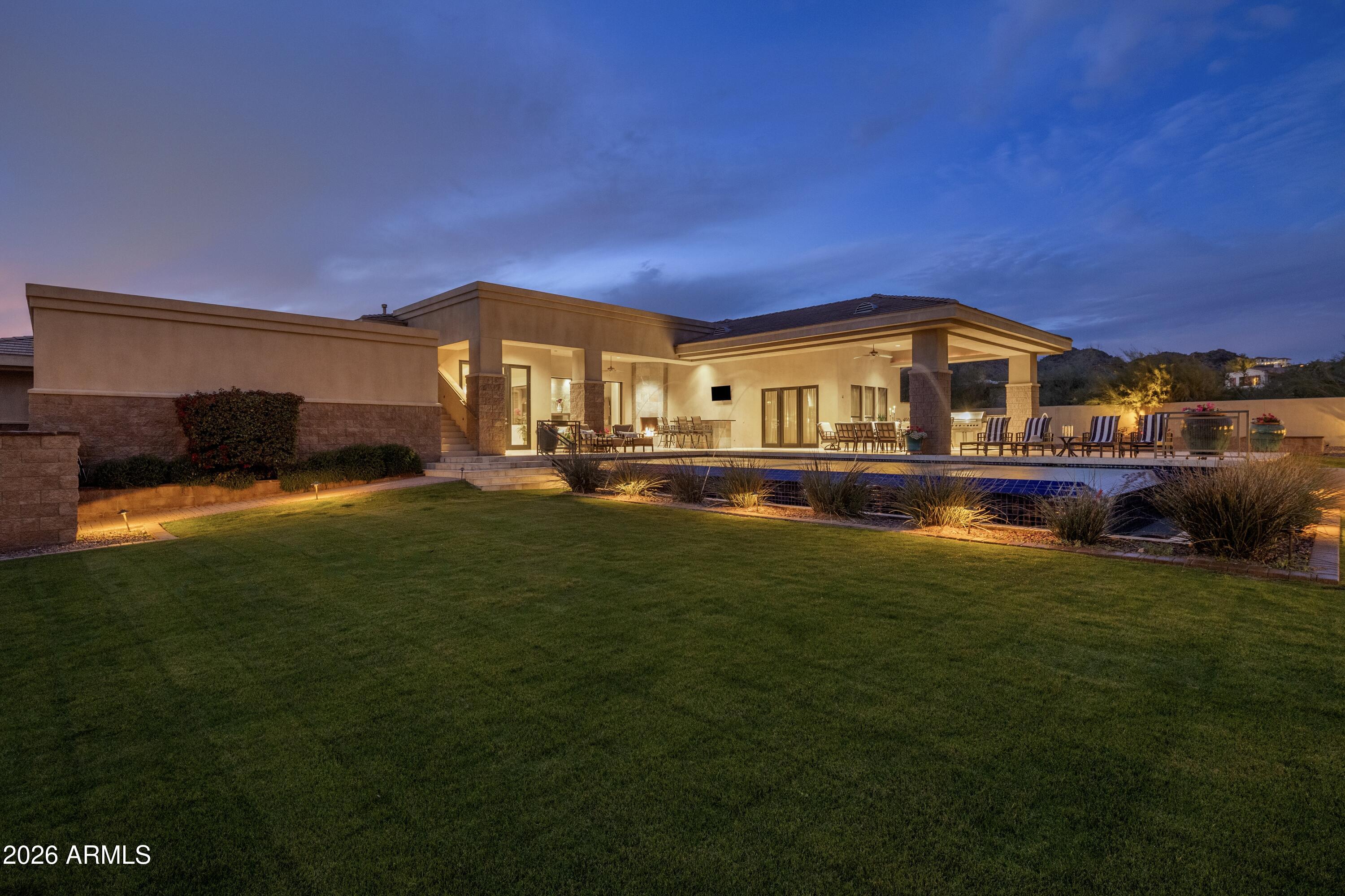 6109 North Palo Cristi Road Paradise Valley, AZ 85253 - Photo 23 of 52 Backyard at twilight