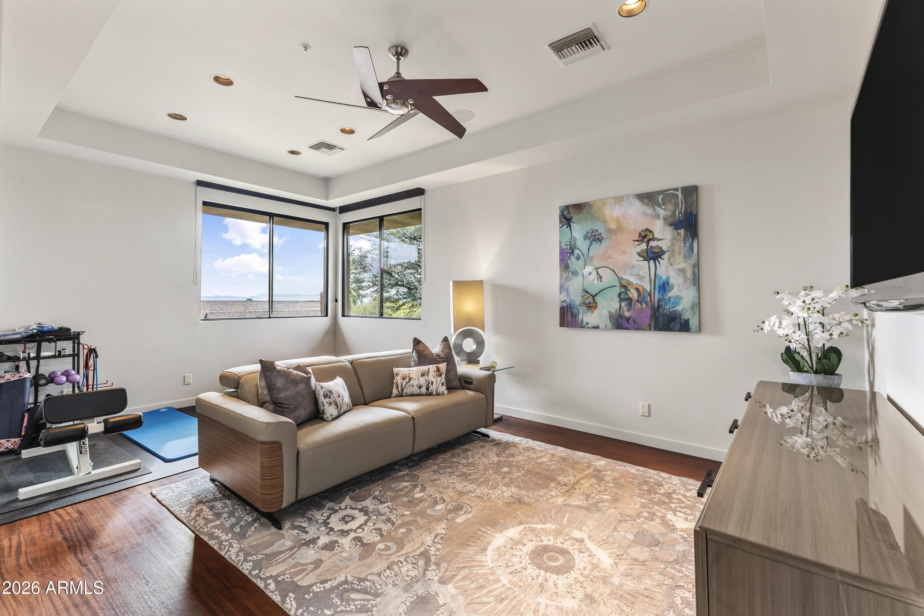 6109 North Palo Cristi Road Paradise Valley, AZ 85253 - Photo 31 of 76 a living room with furniture and a flat screen tv
