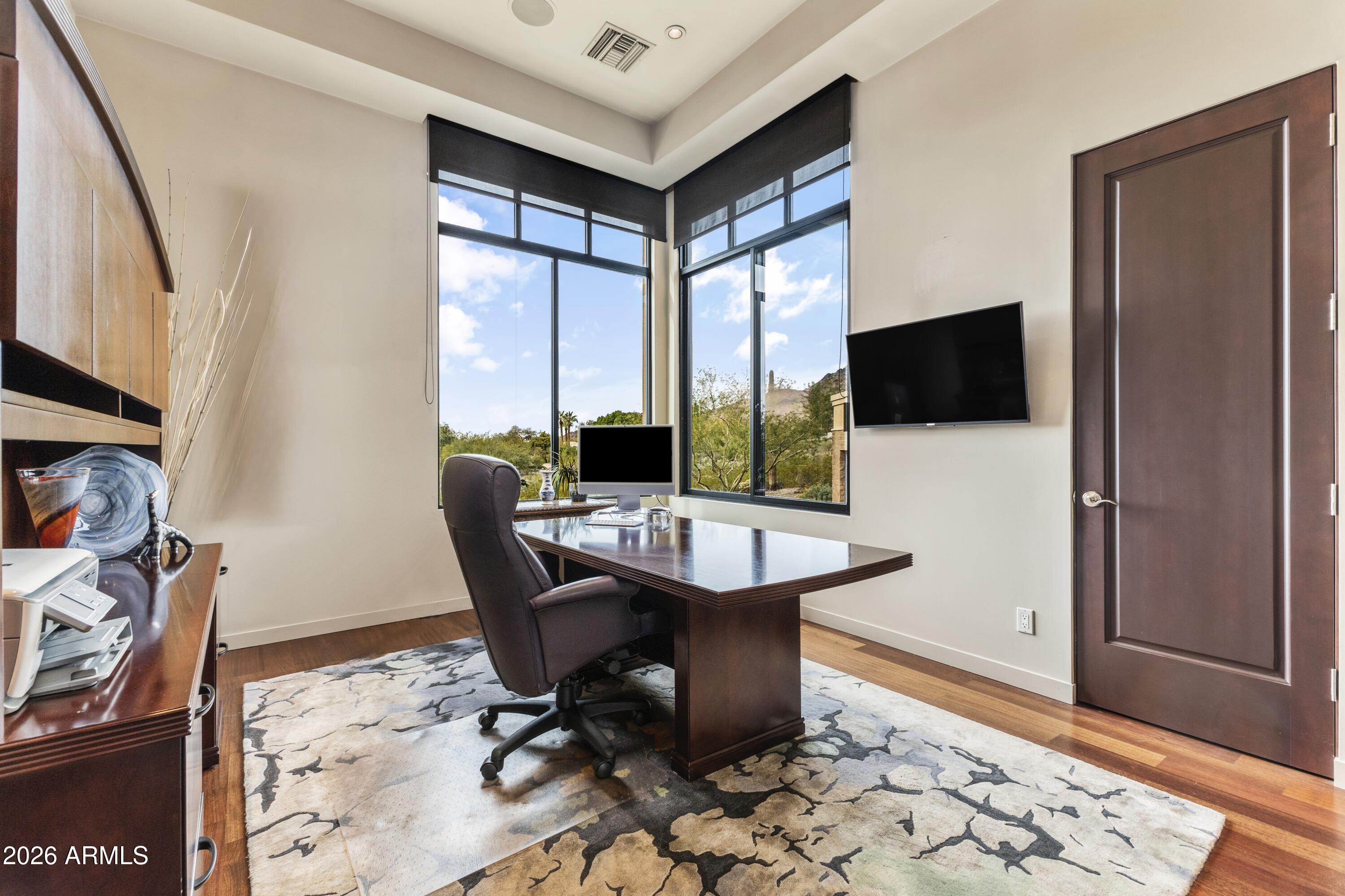 6109 North Palo Cristi Road Paradise Valley, AZ 85253 - Photo 33 of 76 a view of a workspace with furniture and a window