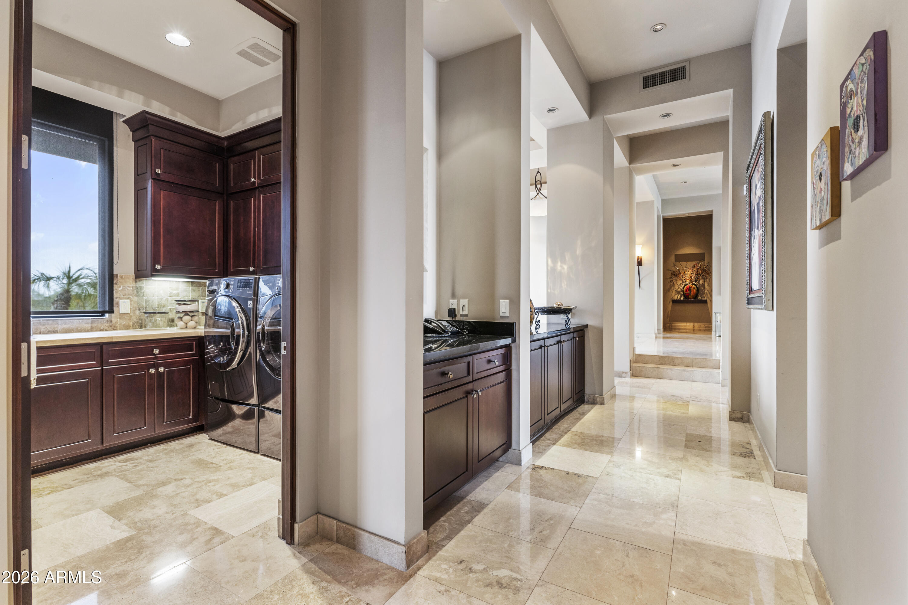 6109 North Palo Cristi Road Paradise Valley, AZ 85253 - Photo 36 of 76 a kitchen with a refrigerator and a stove top oven