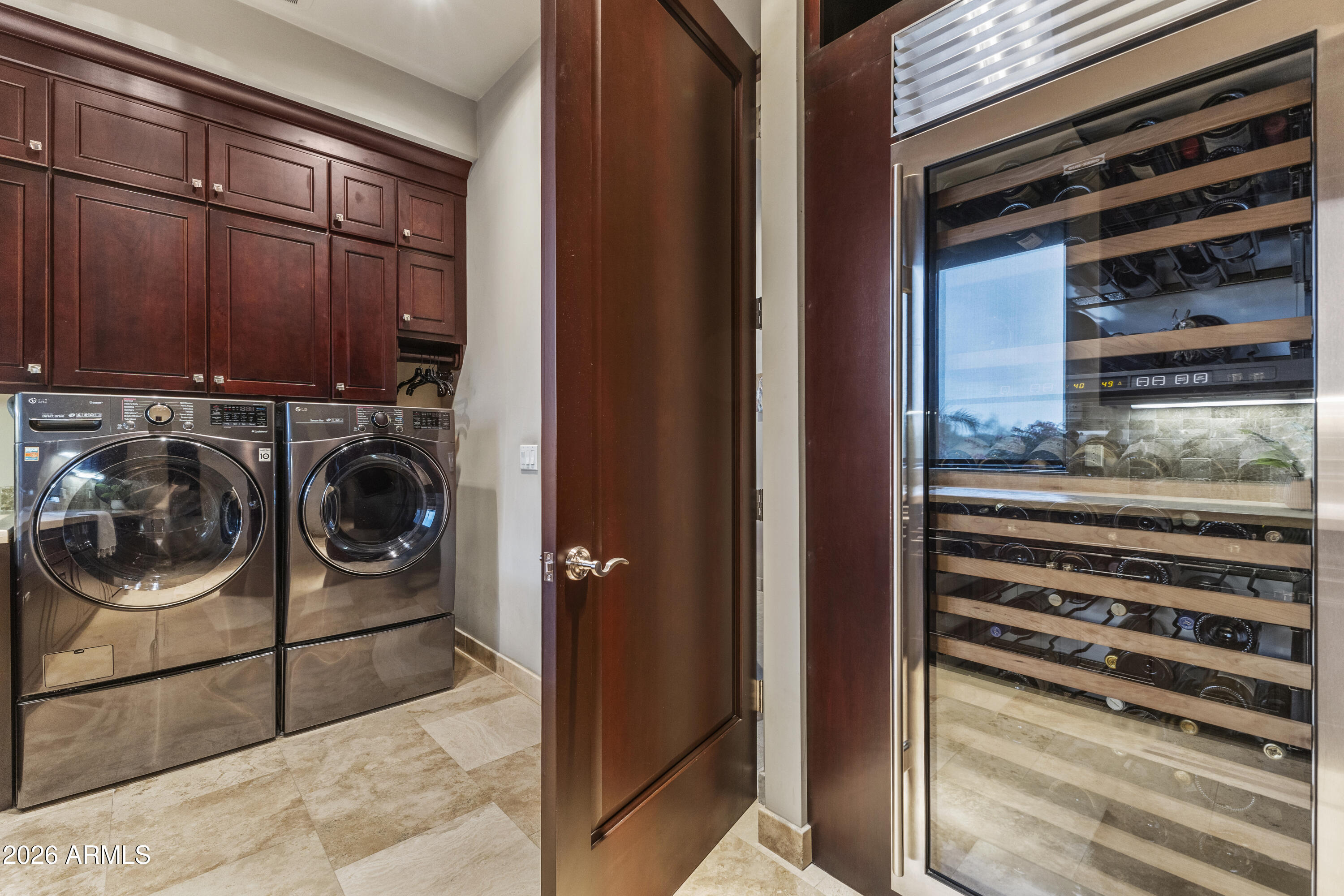 6109 North Palo Cristi Road Paradise Valley, AZ 85253 - Photo 37 of 76 a utility room with dryer and washer