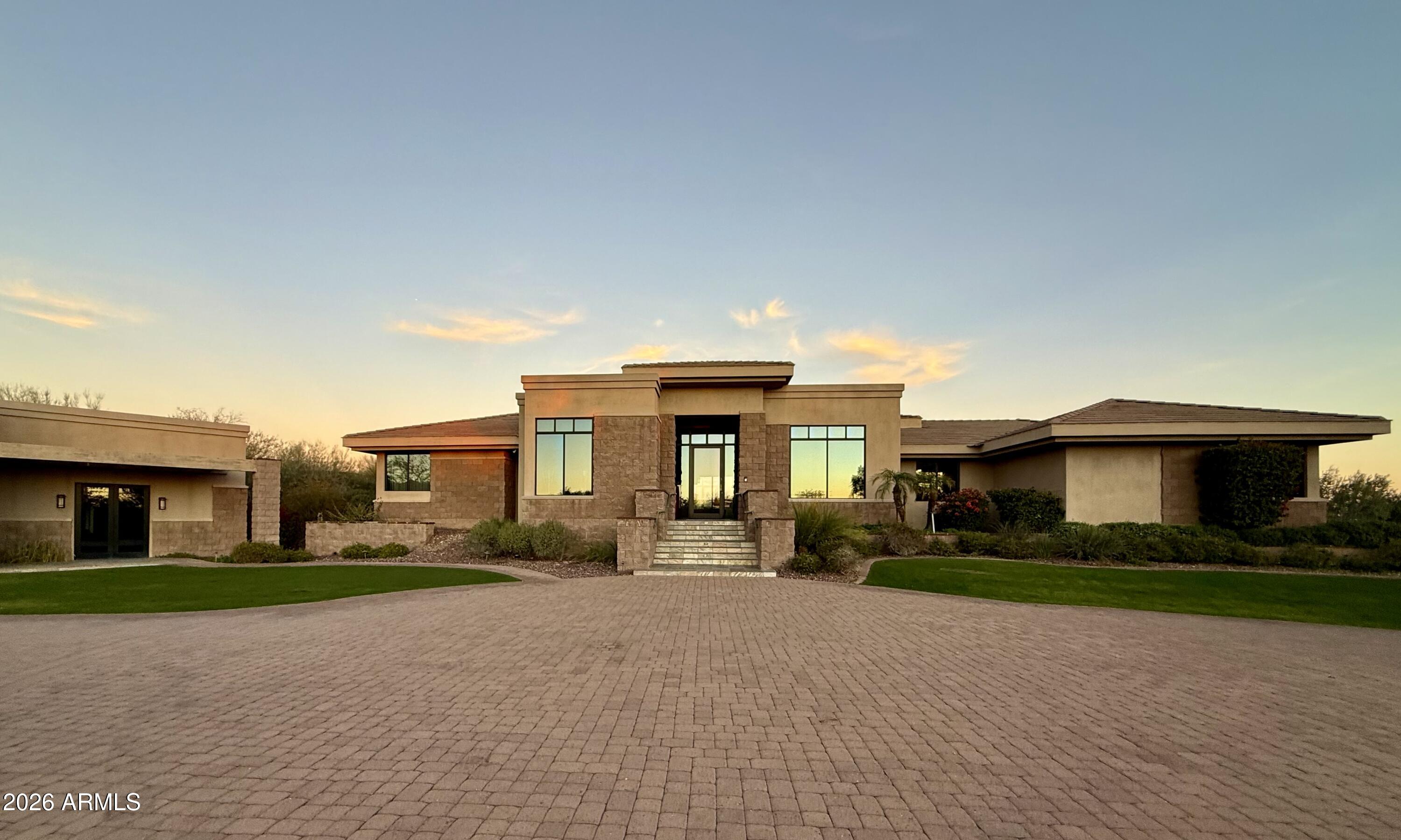 6109 North Palo Cristi Road Paradise Valley, AZ 85253 - Photo 51 of 76 a front view of house with yard and green space