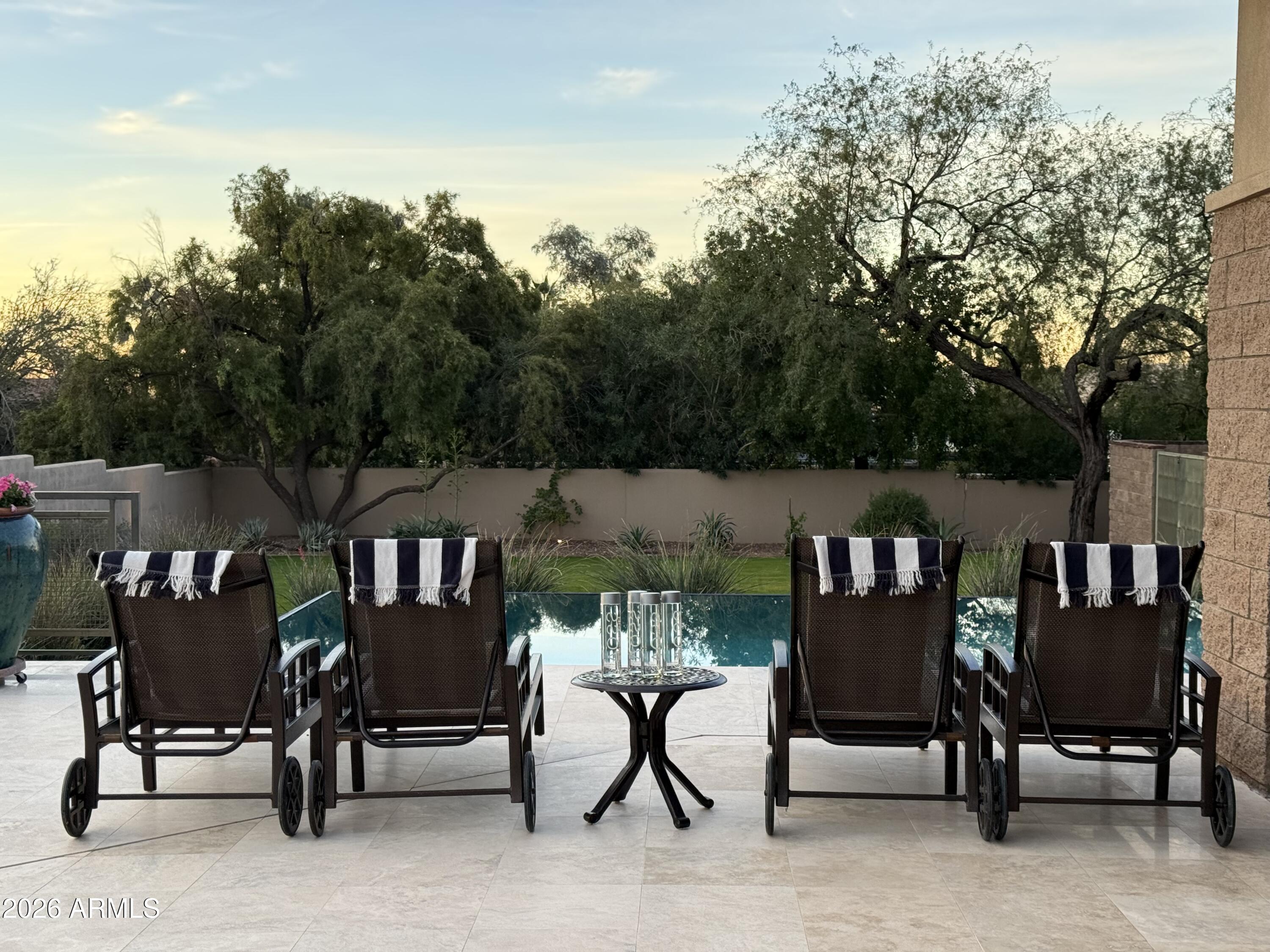 6109 North Palo Cristi Road Paradise Valley, AZ 85253 - Photo 58 of 76 a view of an chairs and tables in the patio