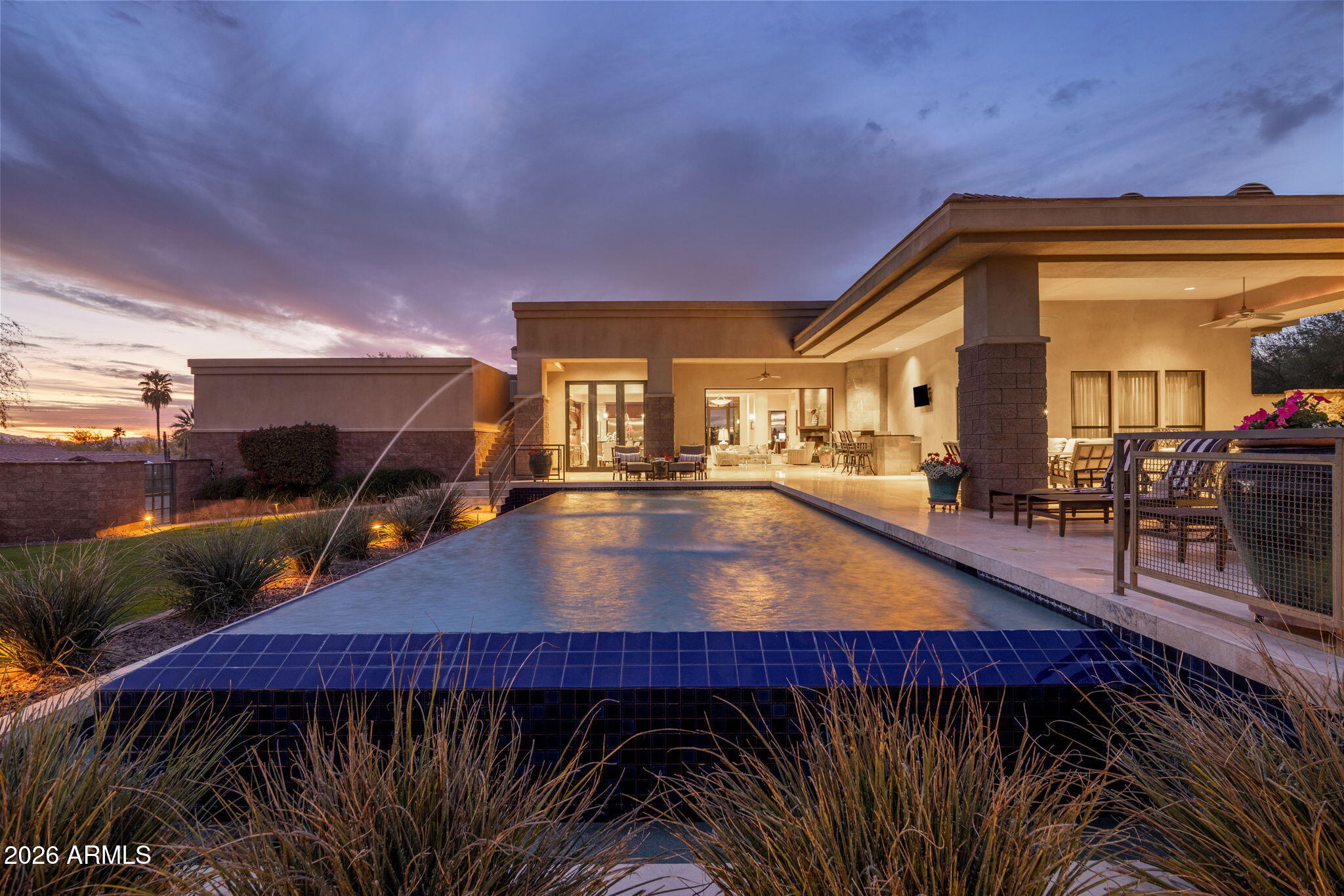 6109 North Palo Cristi Road Paradise Valley, AZ 85253 - Photo 67 of 76 a view of a swimming pool with outdoor seating