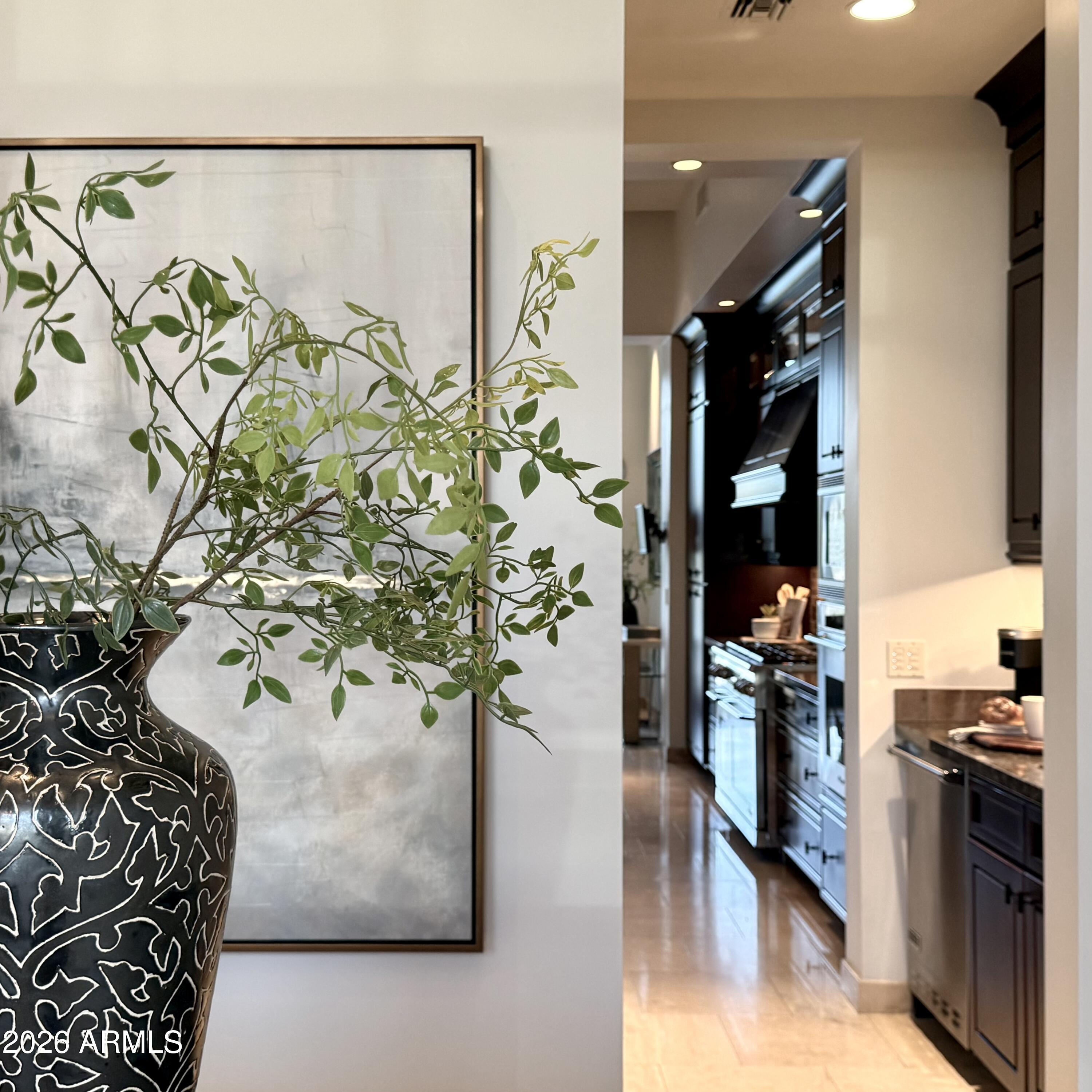 6109 North Palo Cristi Road Paradise Valley, AZ 85253 - Photo 7 of 52 Butlers pantry and peak into the kitchen