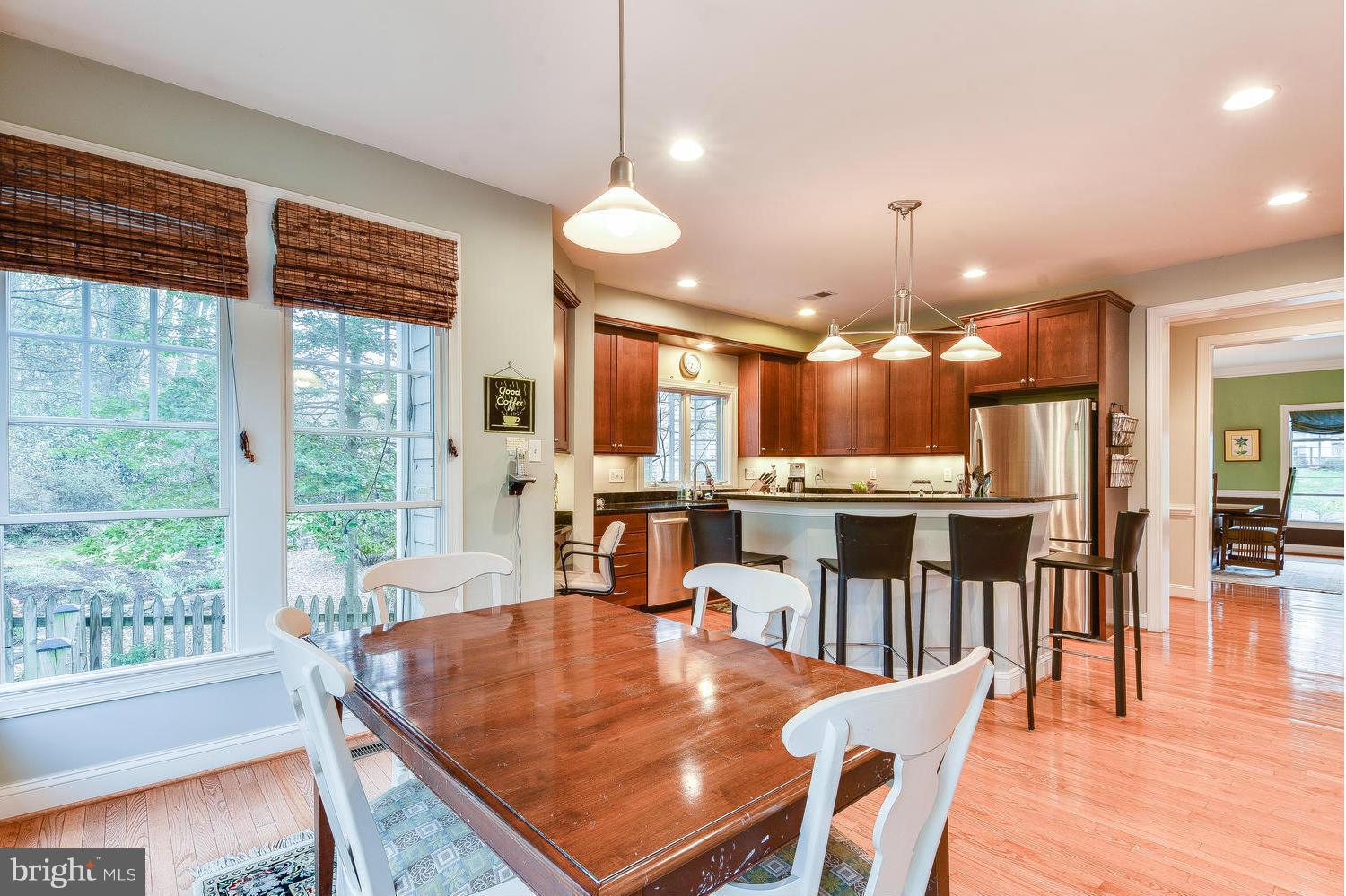 1500 Grace Church Road Silver Spring, MD 20910 - Photo 12 of 30 a dining room with wooden floor and large window