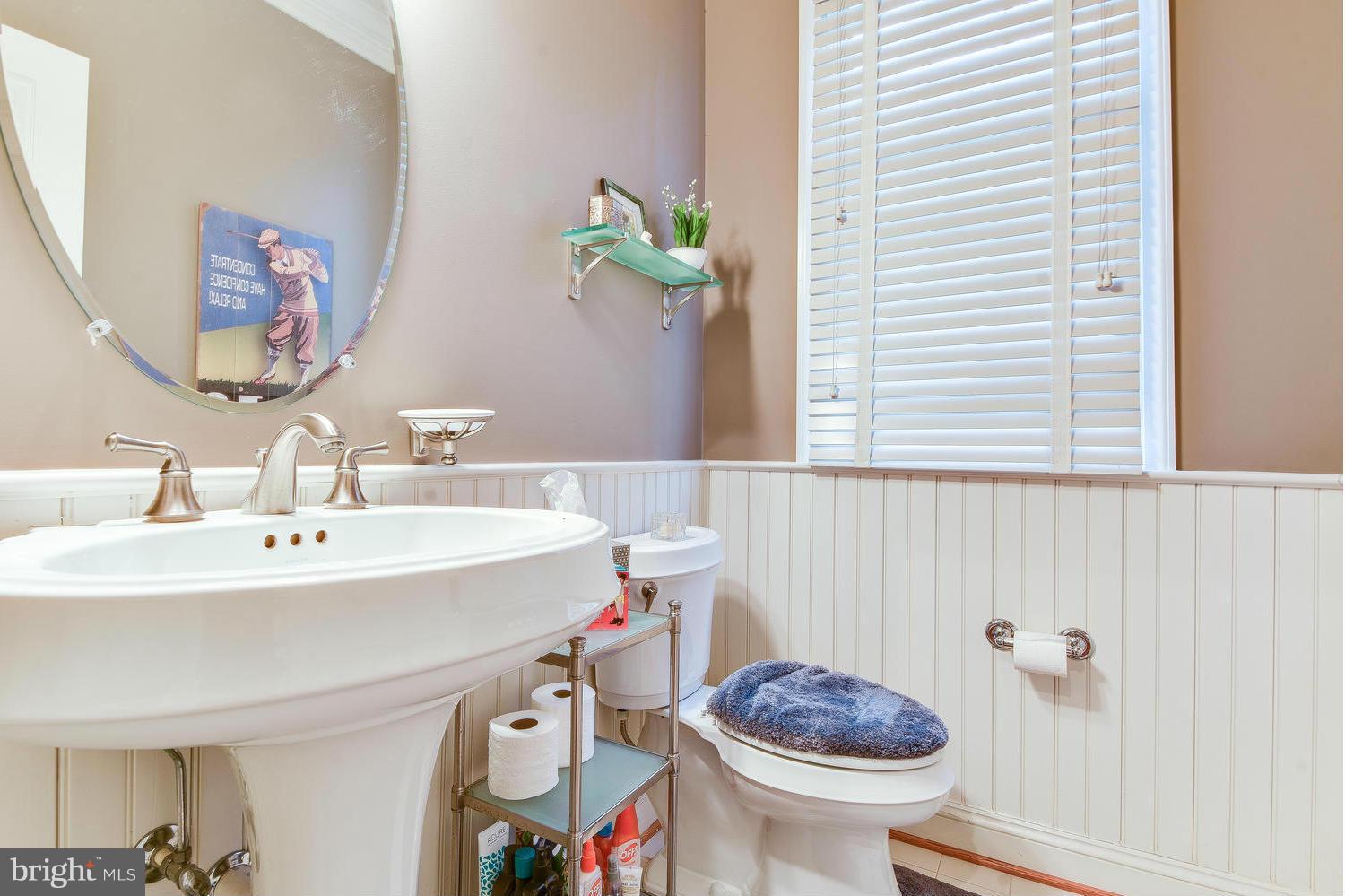 1500 Grace Church Road Silver Spring, MD 20910 - Photo 15 of 30 a bathroom with a sink toilet and a mirror