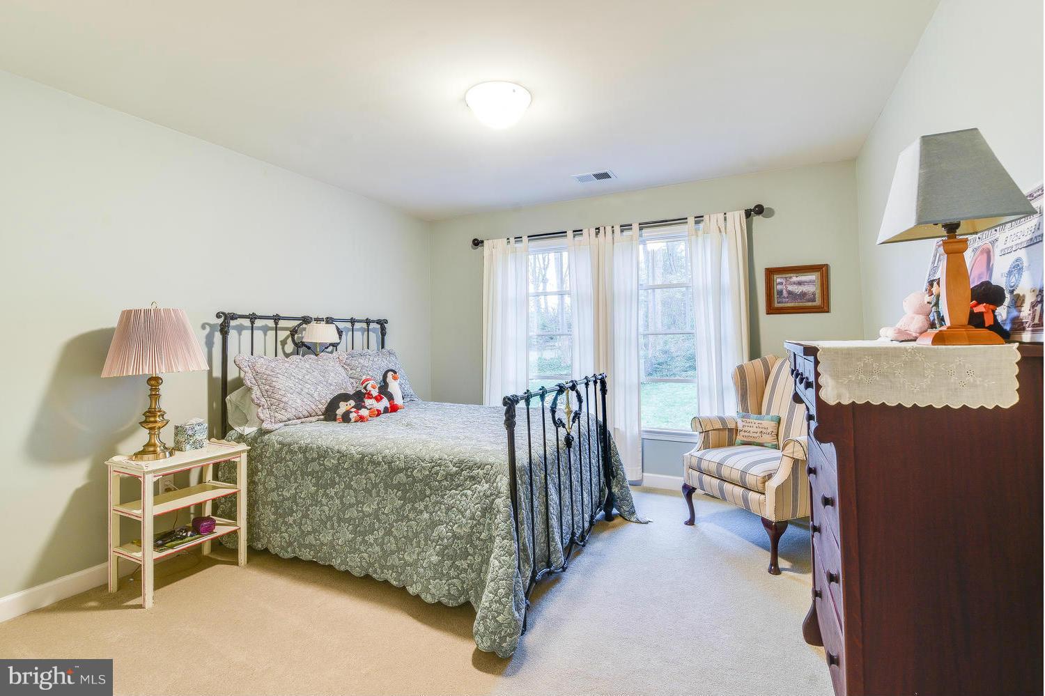 1500 Grace Church Road Silver Spring, MD 20910 - Photo 21 of 30 a bedroom with a bed and a window