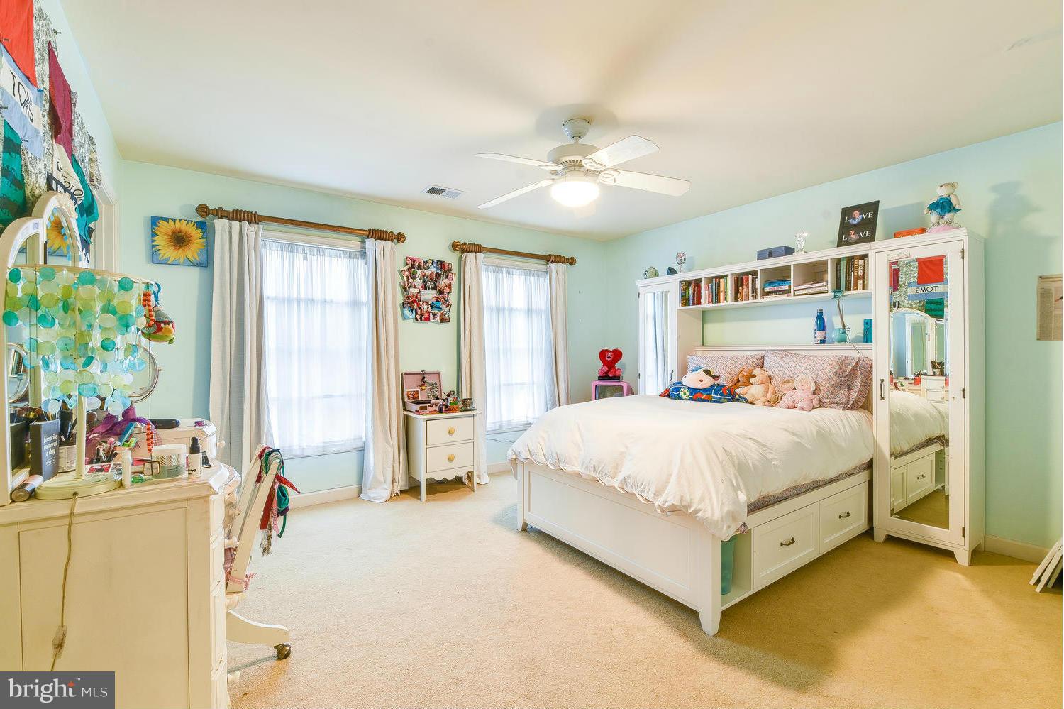 1500 Grace Church Road Silver Spring, MD 20910 - Photo 23 of 30 a bed room with a bed and a book shelf