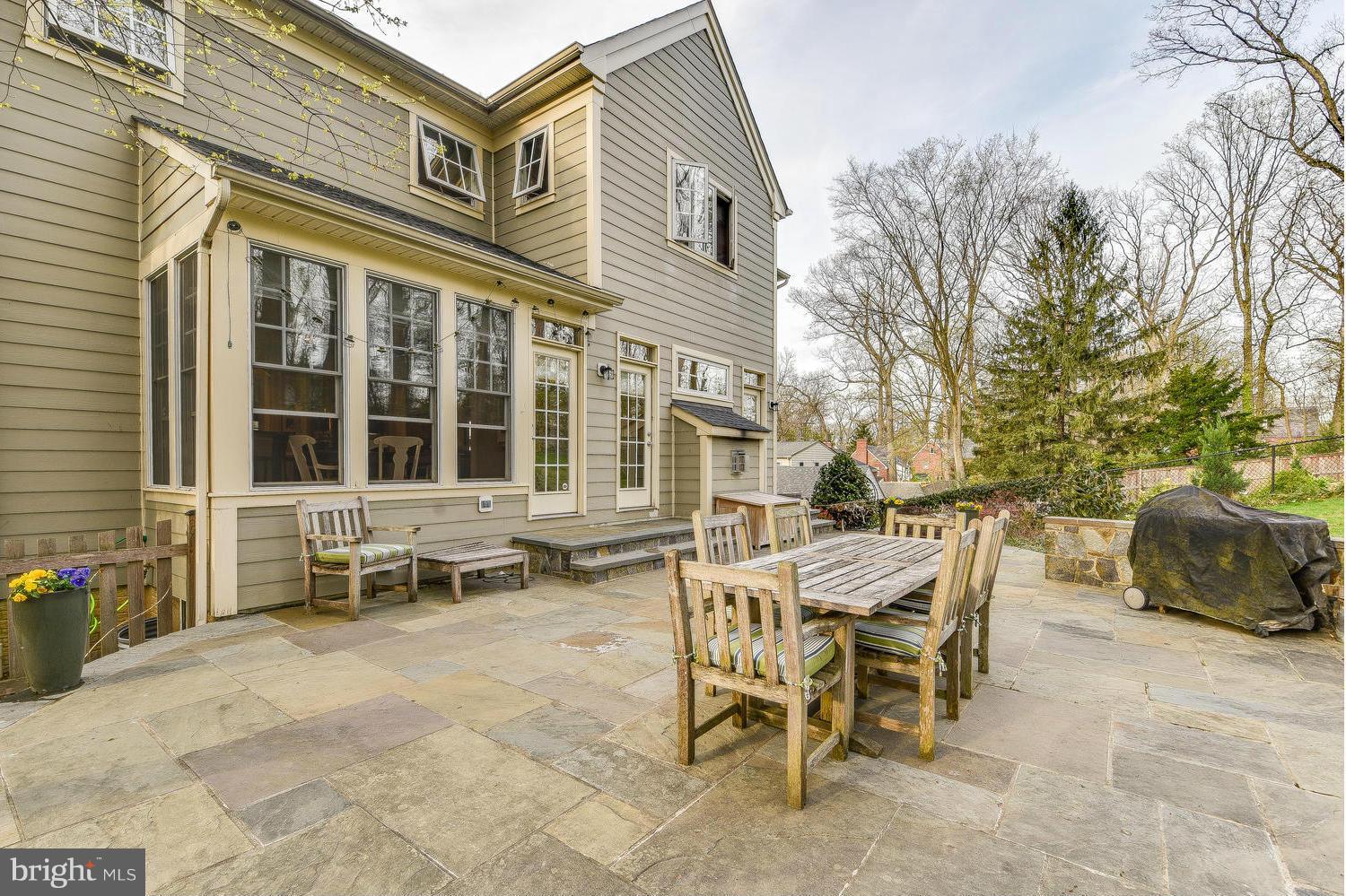 1500 Grace Church Road Silver Spring, MD 20910 - Photo 27 of 30 a view of a dinning table and chairs in the patio
