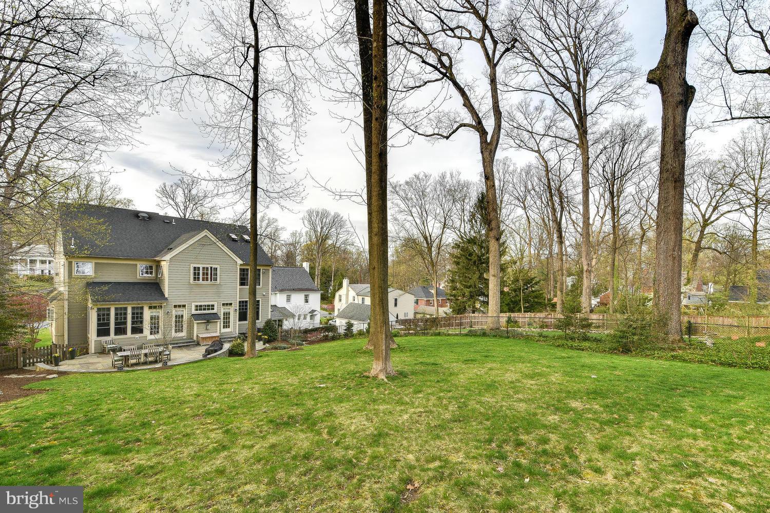 1500 Grace Church Road Silver Spring, MD 20910 - Photo 29 of 30 a front view of a house with a garden and trees