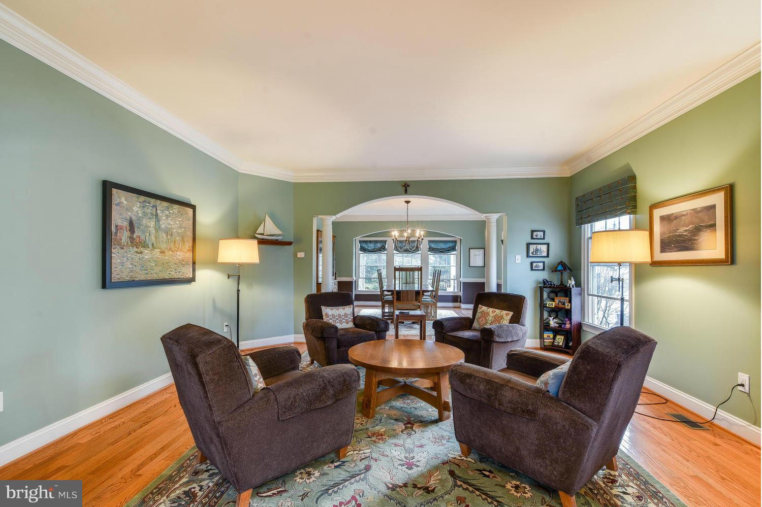 1500 Grace Church Road Silver Spring, MD 20910 - Photo 4 of 30 a living room with furniture a fireplace and a large window