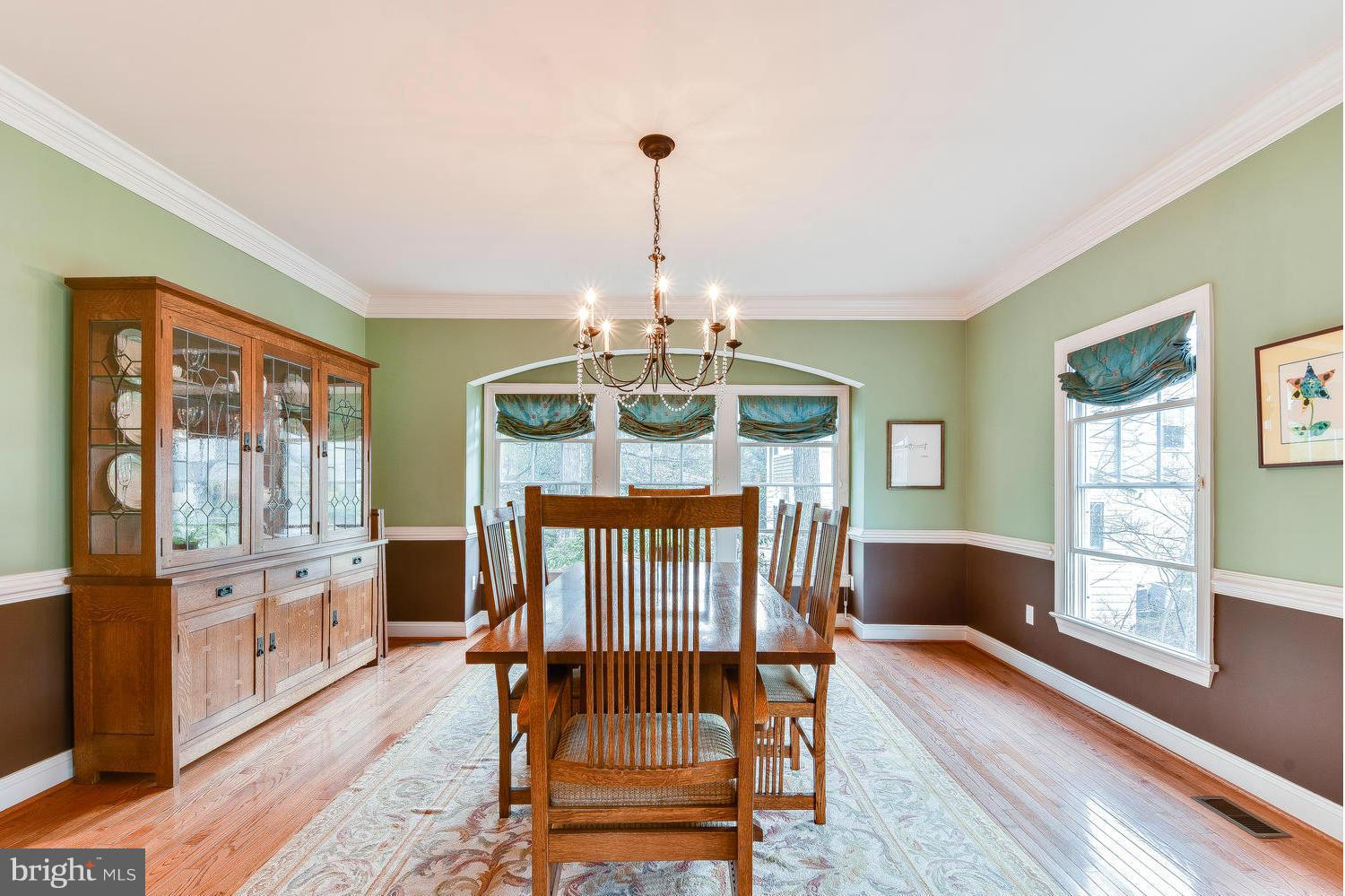 1500 Grace Church Road Silver Spring, MD 20910 - Photo 7 of 30 a view of a dining room with furniture window and wooden floor