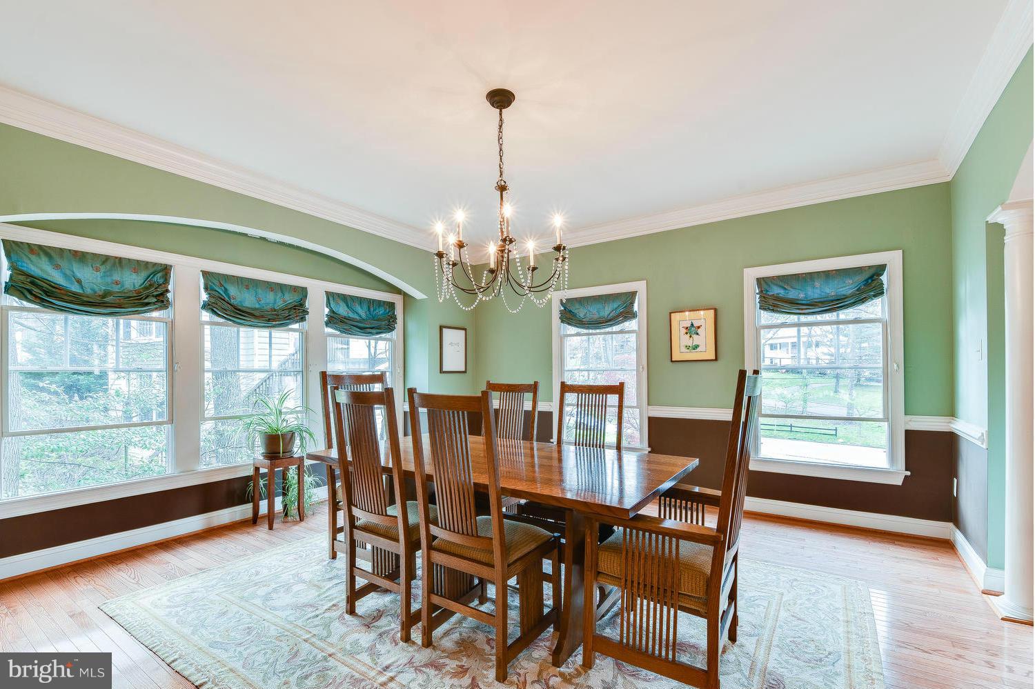 1500 Grace Church Road Silver Spring, MD 20910 - Photo 8 of 30 a view of a dining room with furniture a chandelier and wooden floor
