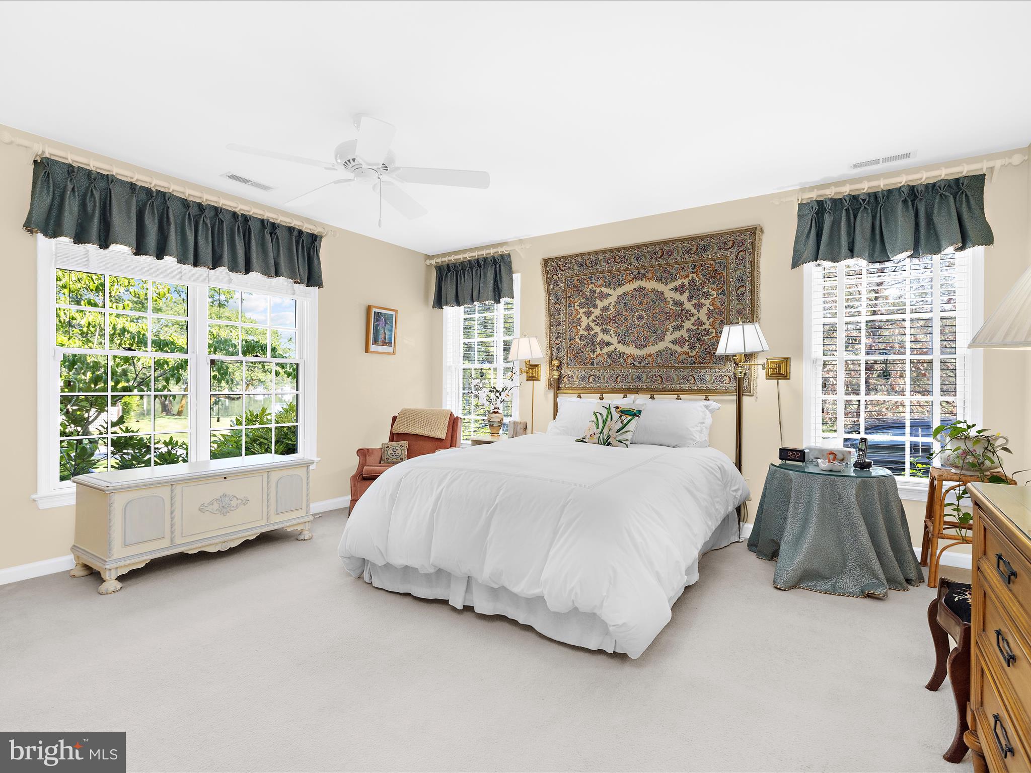 8698 Cummings Road Wittman, MD 21676 - Photo 20 of 63 a bedroom with a bed and glass window