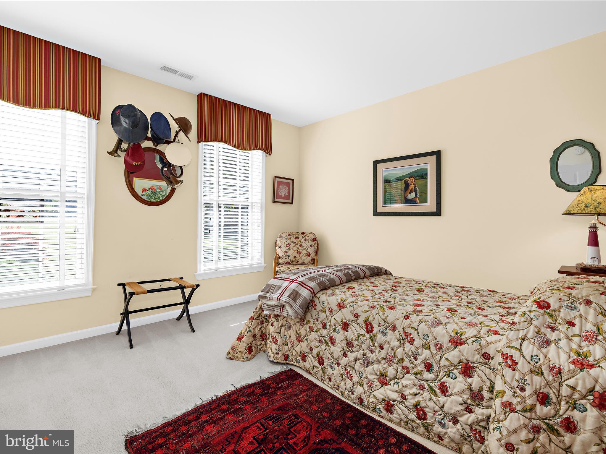 8698 Cummings Road Wittman, MD 21676 - Photo 28 of 63 a bedroom with bed and a window