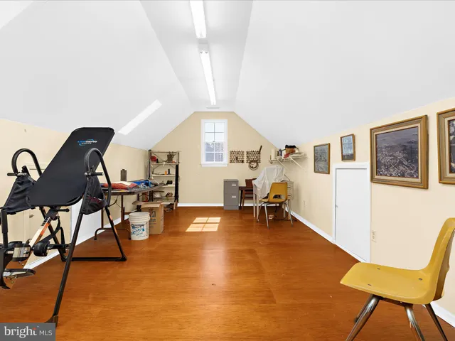 a view of a swimming pool with lounge chair