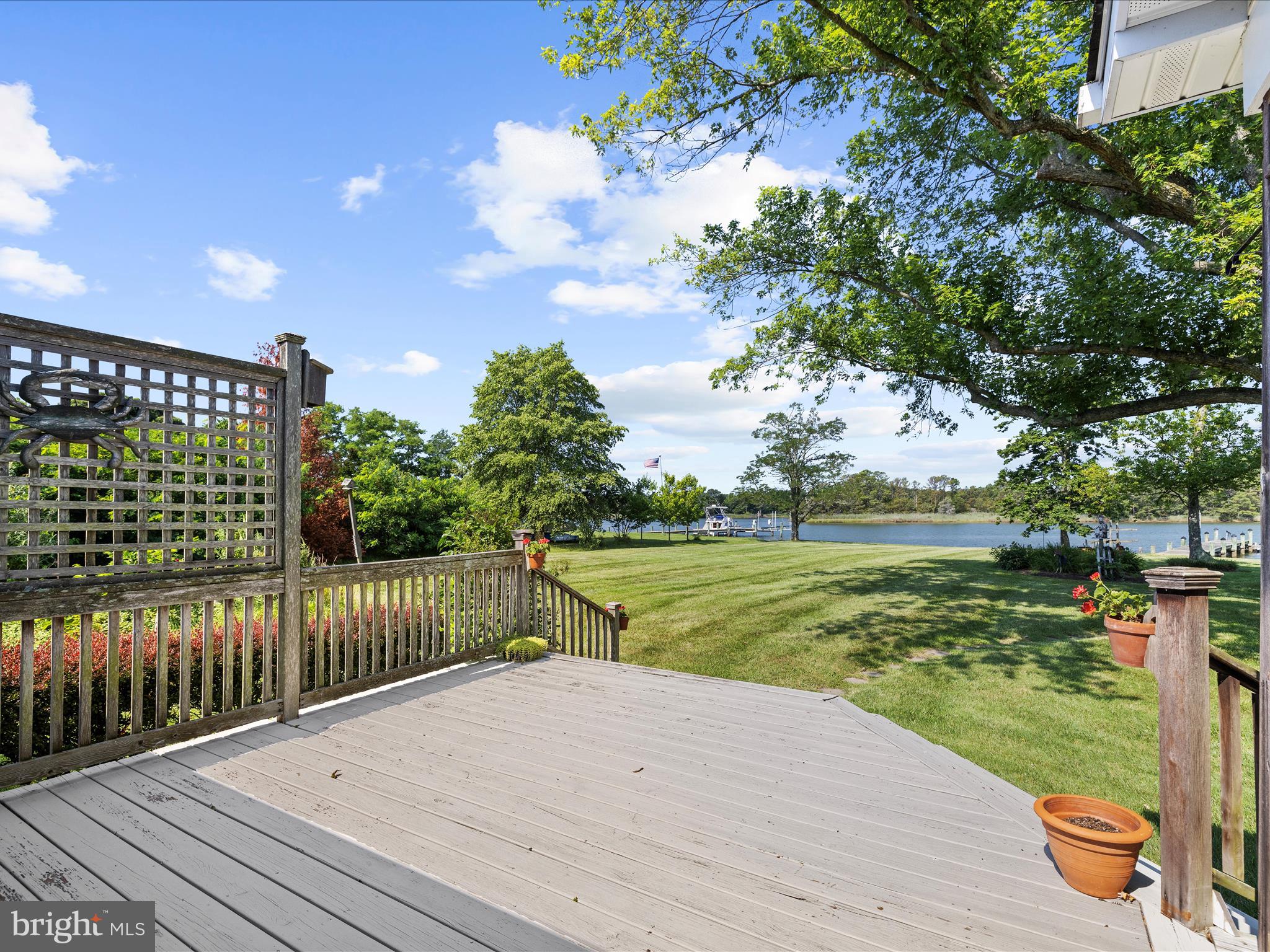 8698 Cummings Road Wittman, MD 21676 - Photo 39 of 63 a view of a street with a wooden bridge