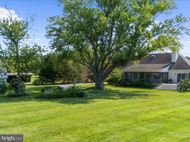 a view of outside space and a lake view