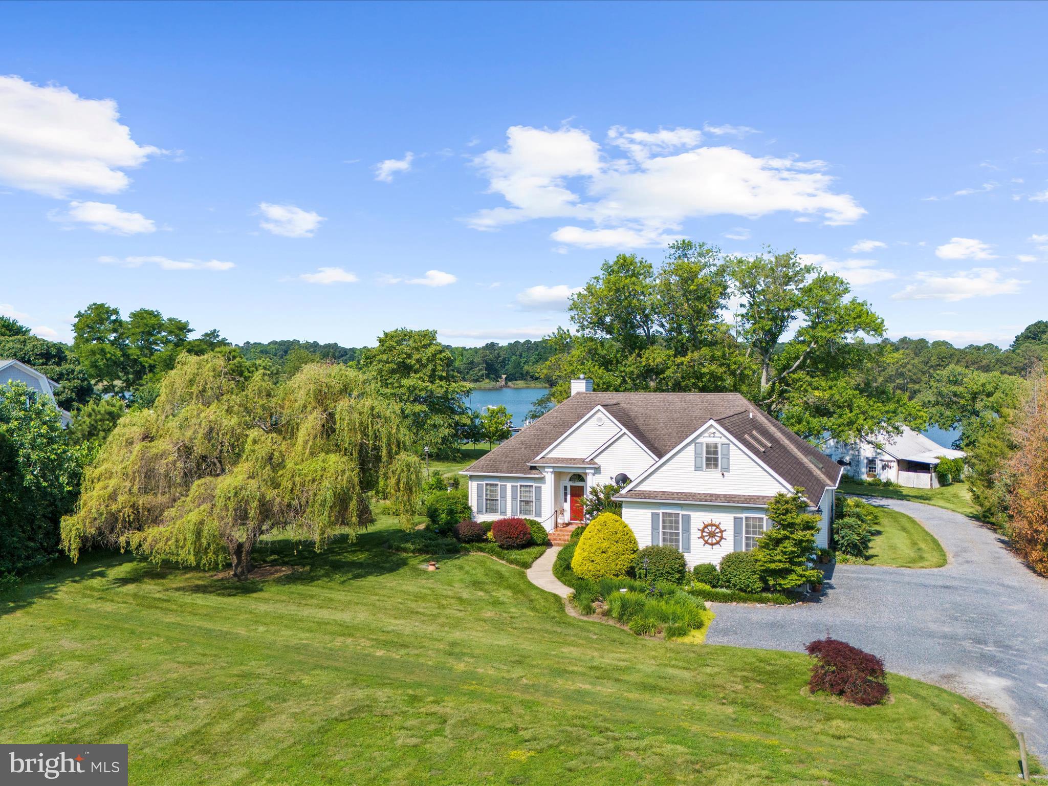 8698 Cummings Road Wittman, MD 21676 - Photo 47 of 63 a front view of a house with garden