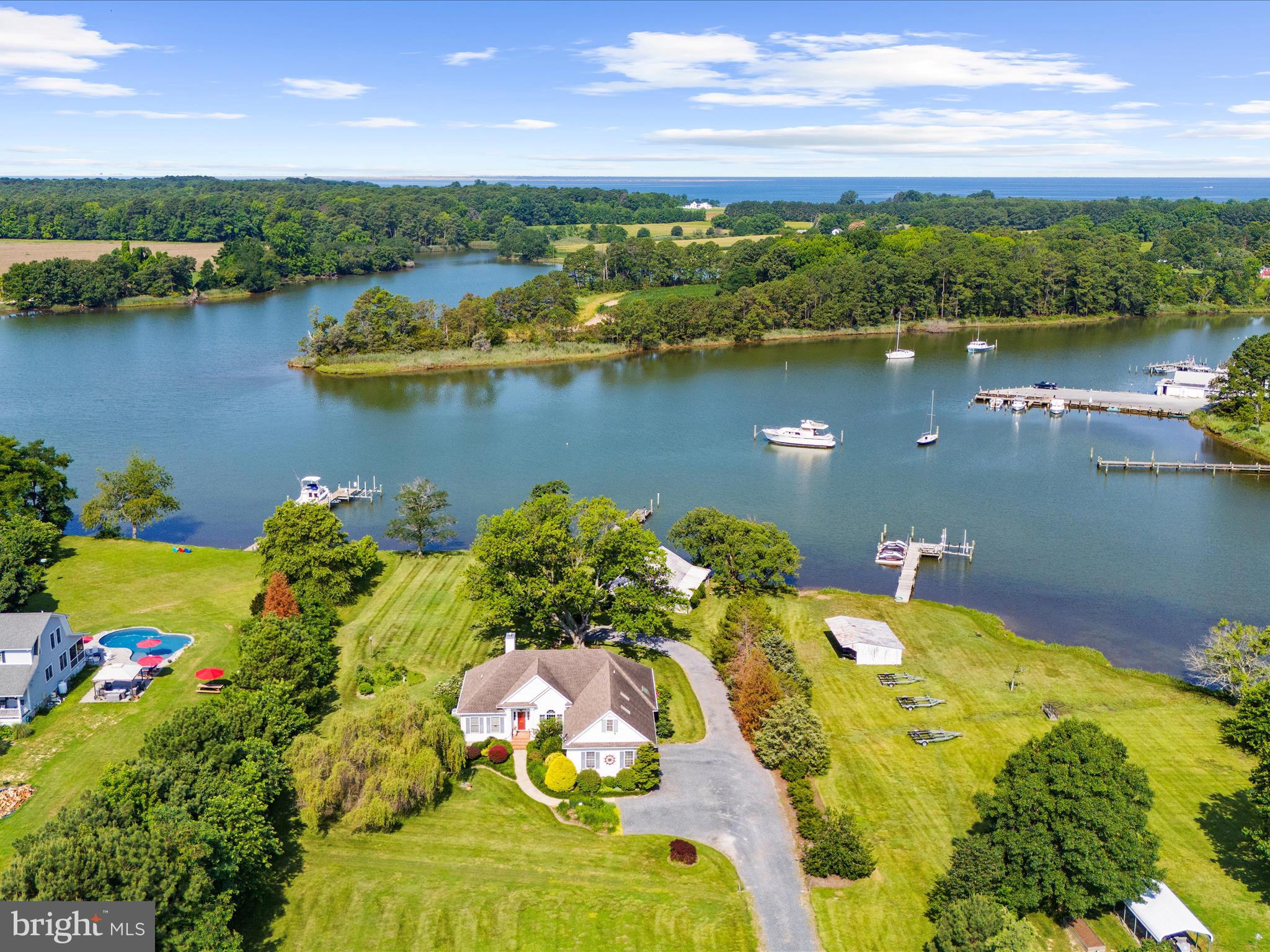 8698 Cummings Road Wittman, MD 21676 - Photo 57 of 63 an aerial view of a houses with a lake view