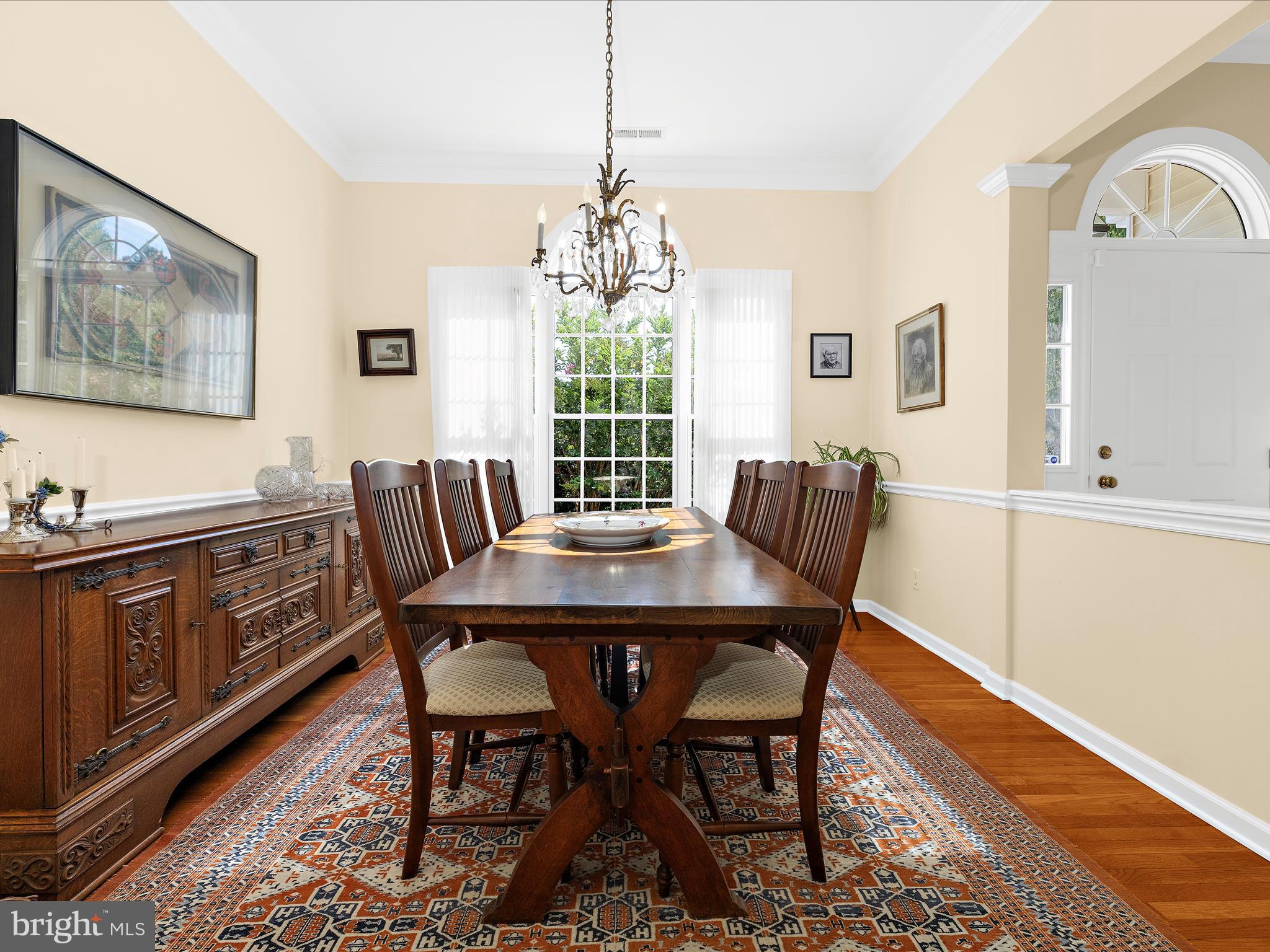 8698 Cummings Road Wittman, MD 21676 - Photo 7 of 63 a view of a dining room with furniture window and wooden floor