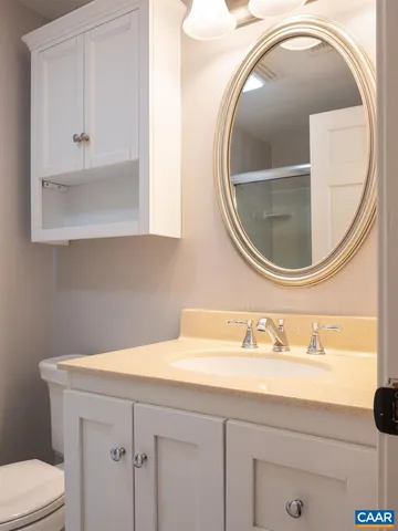 a bathroom with a sink and mirror