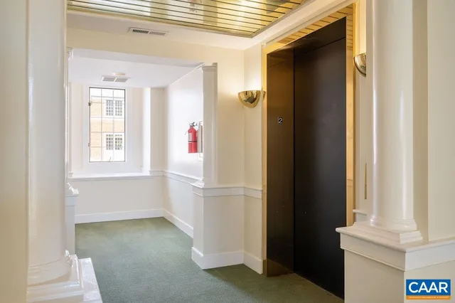 a view of entry way with wooden floor