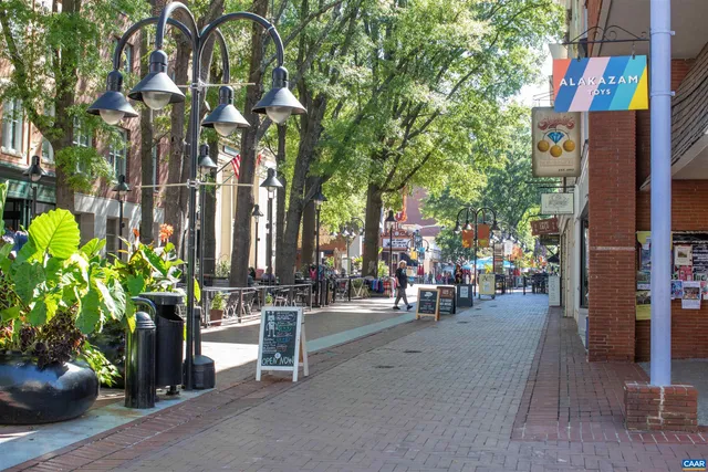 a view of street with sitting area