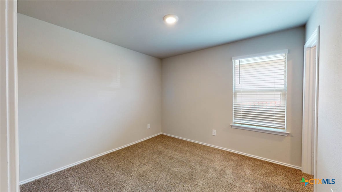 233 Boatright Boulevard Jarrell, TX 76537 - Photo 19 of 22 an empty room with a window