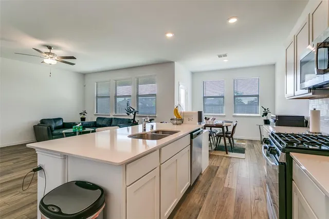 a living room with furniture and a table