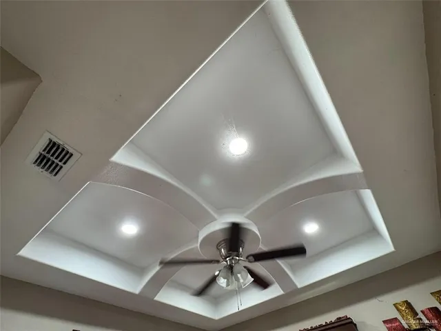 a bedroom with a bed closet and flat tv screen