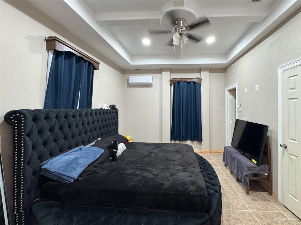 23960 North Texan Road Edinburg, TX 78541 - Photo 16 of 31 a bedroom with bed and window