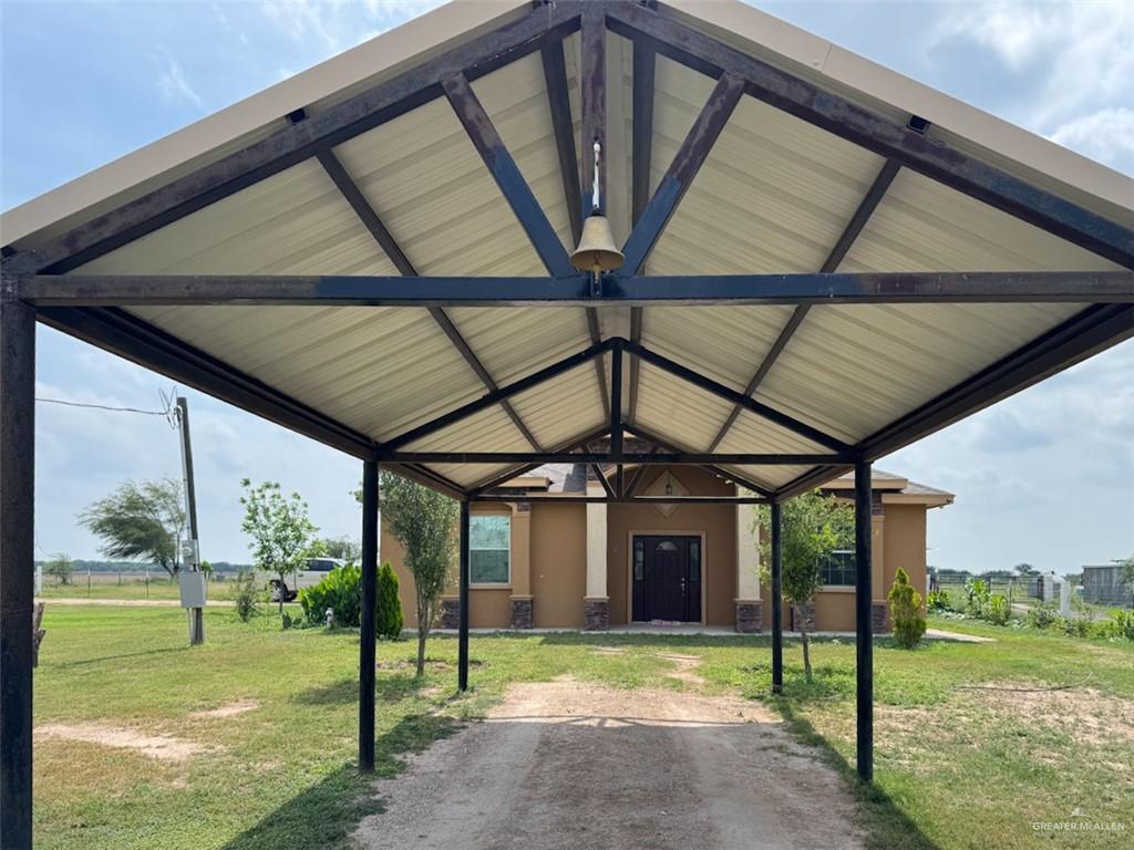 23960 North Texan Road Edinburg, TX 78541 - Photo 19 of 31 a view of a big room with porch and furniture