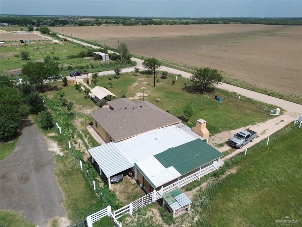 23960 North Texan Road Edinburg, TX 78541 - Photo 21 of 31 an aerial view of a house with garden space and outdoor seating
