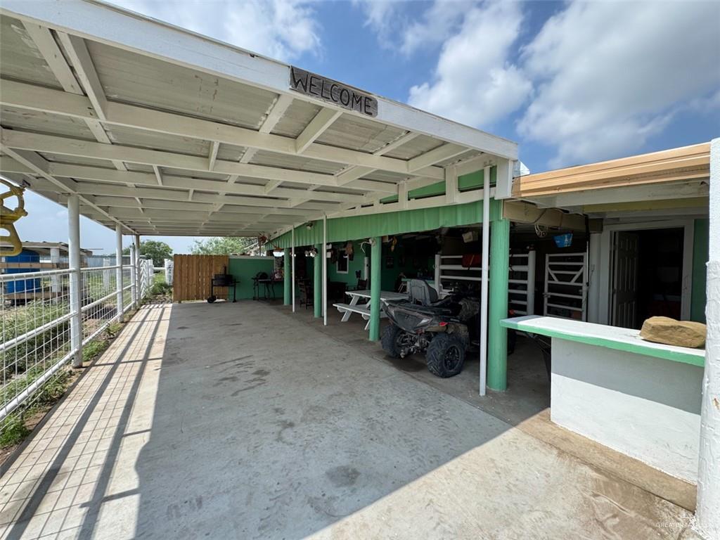 23960 North Texan Road Edinburg, TX 78541 - Photo 28 of 31 a view of a porch with furniture